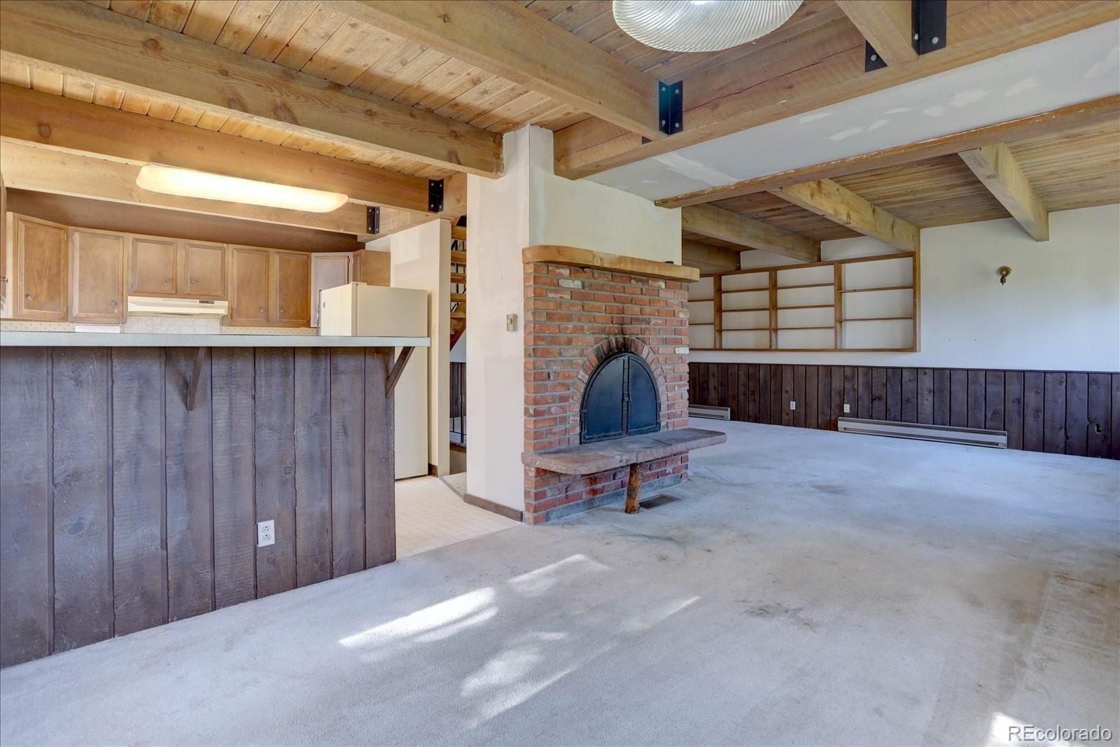 1999 Roland Drive Bailey, CO 80421 - Photo 15 of 33 a view of a room with furniture and a window