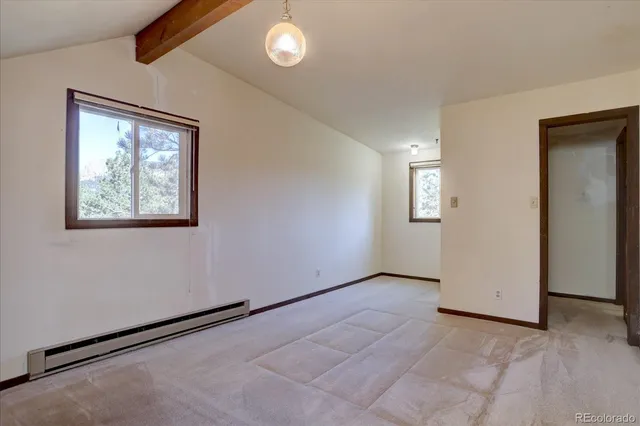 an empty room with windows