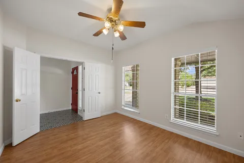 a view of an empty room with a window