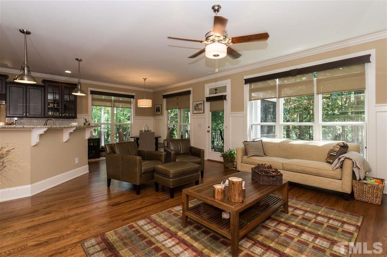 2711 Bembridge Drive Raleigh, NC 27613 - Photo 6 of 25 a living room with furniture and a large window