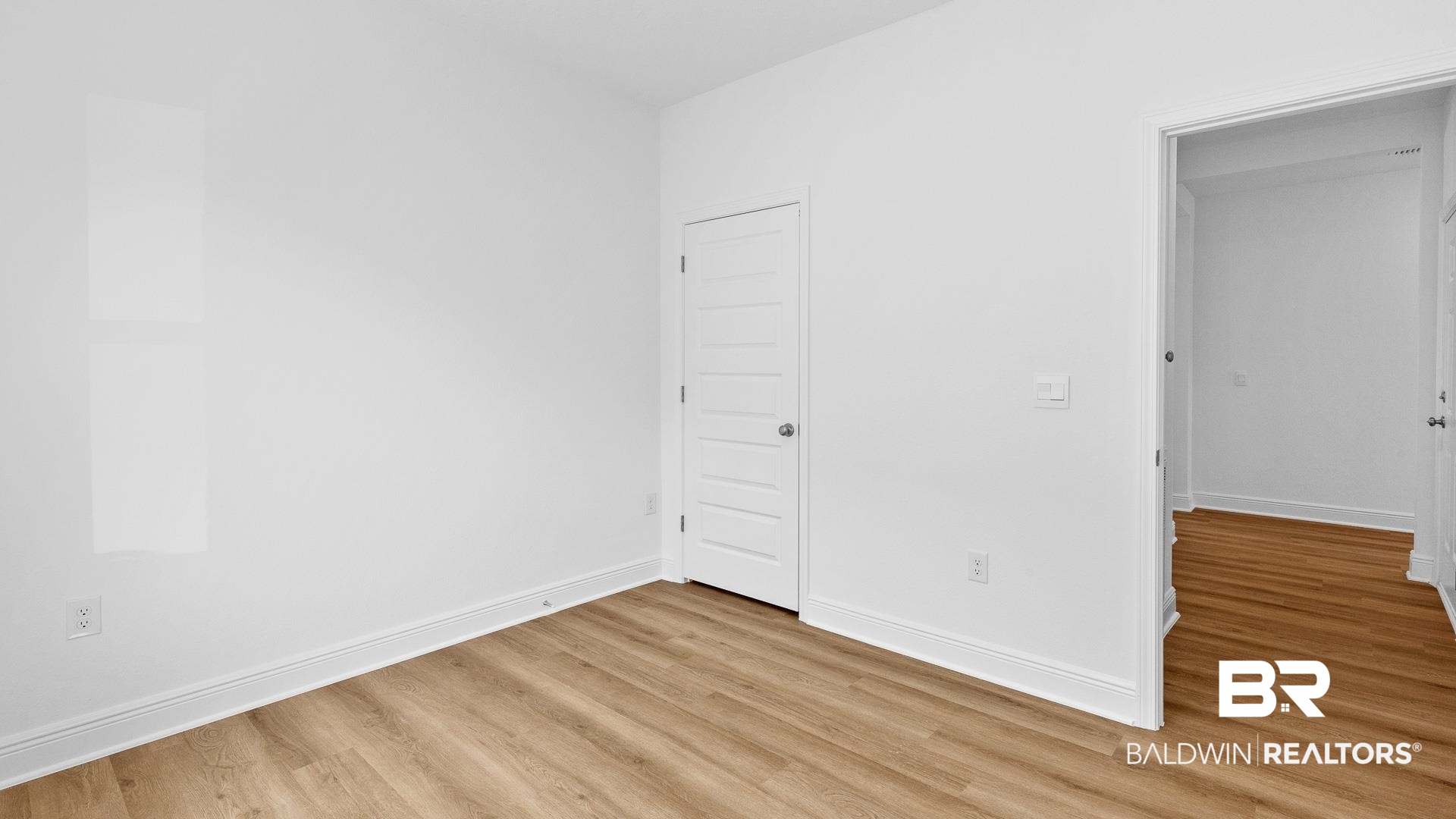 12931 Grand Rpds Road Fairhope, AL 36532 - Photo 12 of 33 Spare room featuring baseboards and light wood-style floors