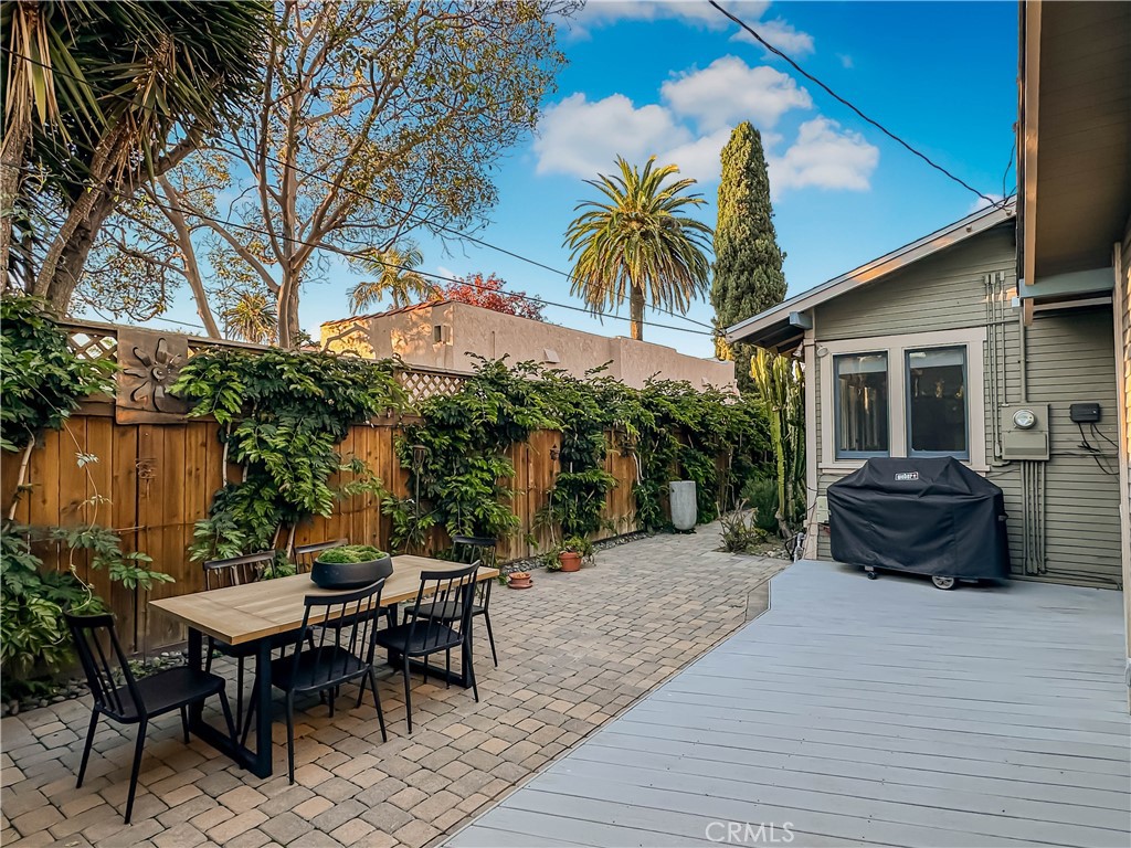 3740 East 5th Street Long Beach, CA 90814 - Photo 22 of 28 a view of a backyard with a sitting area and furniture