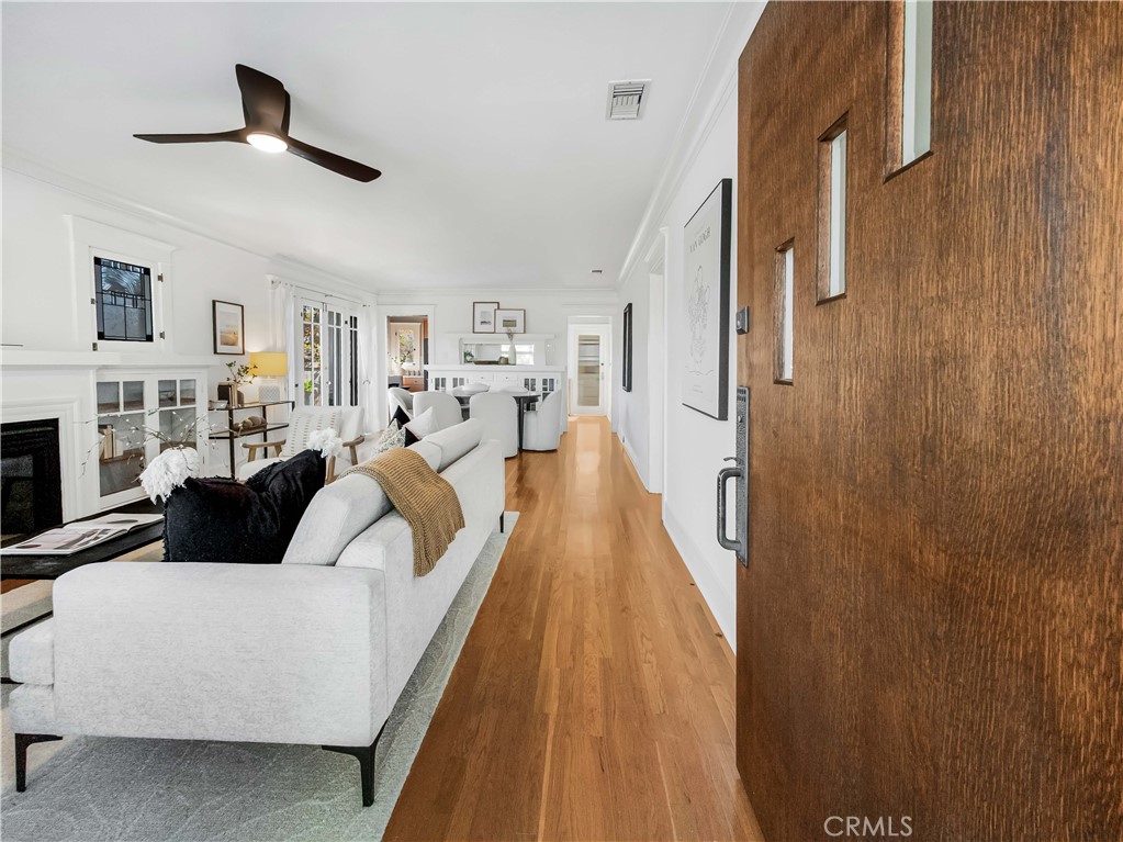 3740 East 5th Street Long Beach, CA 90814 - Photo 3 of 28 a living room with furniture and a fireplace