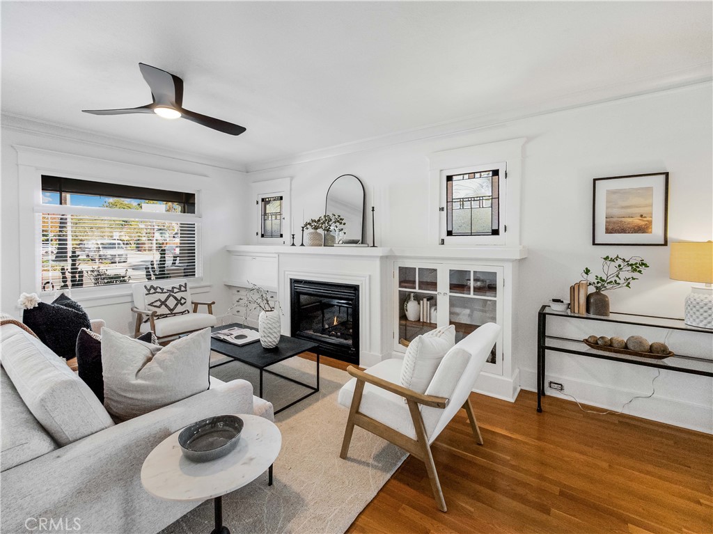 3740 East 5th Street Long Beach, CA 90814 - Photo 5 of 28 a living room with furniture and a fireplace