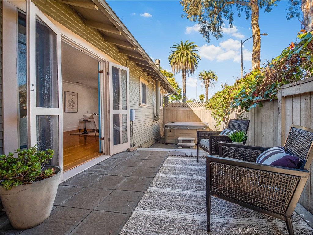 3740 East 5th Street Long Beach, CA 90814 - Photo 8 of 28 a view of a patio with couches and potted plants