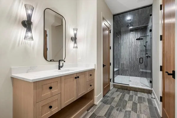 a view of balcony with wooden floor and fence