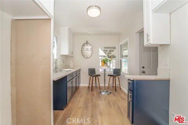 a view of a kitchen and dining area
