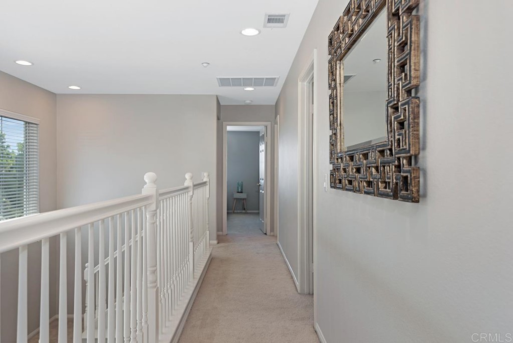 5595 Foxtail Loop Carlsbad, CA 92010 - Photo 16 of 28 a view of a hallway