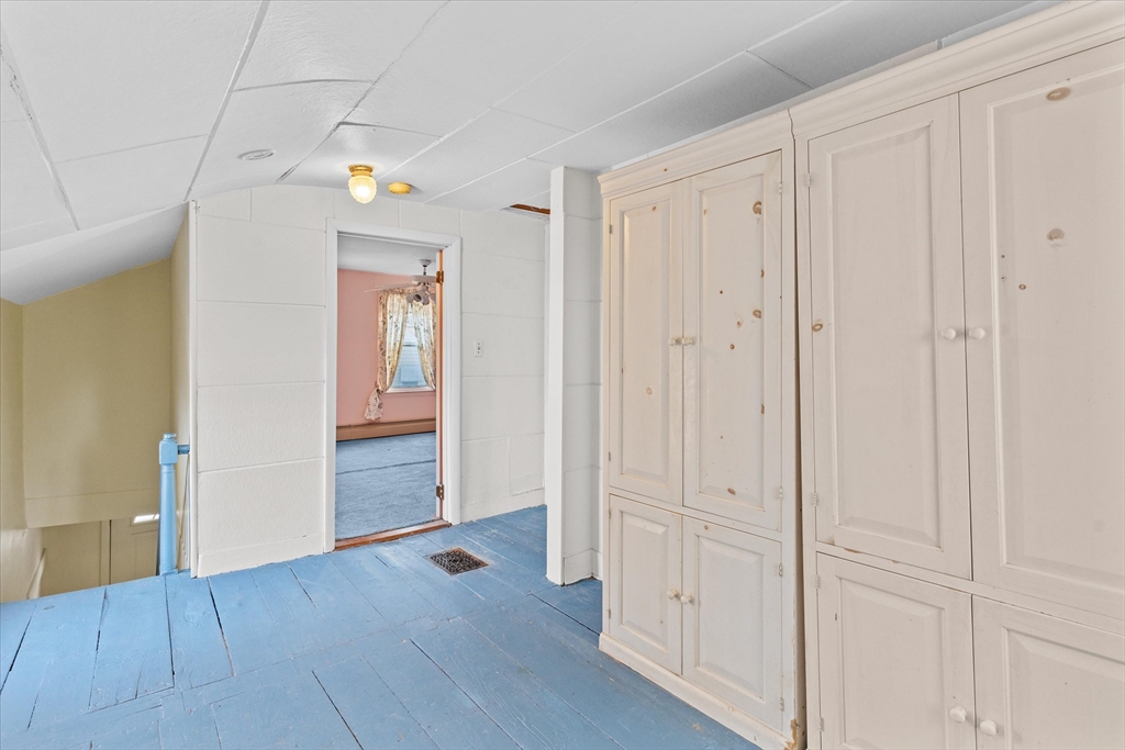 79 Beacon Street Lawrence, MA 01843 - Photo 18 of 29 a view of a hallway with wooden floor