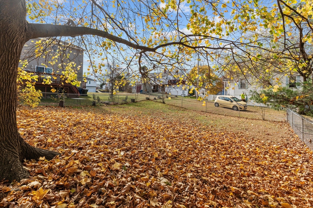 79 Beacon Street Lawrence, MA 01843 - Photo 26 of 29 a view of a yard with an trees