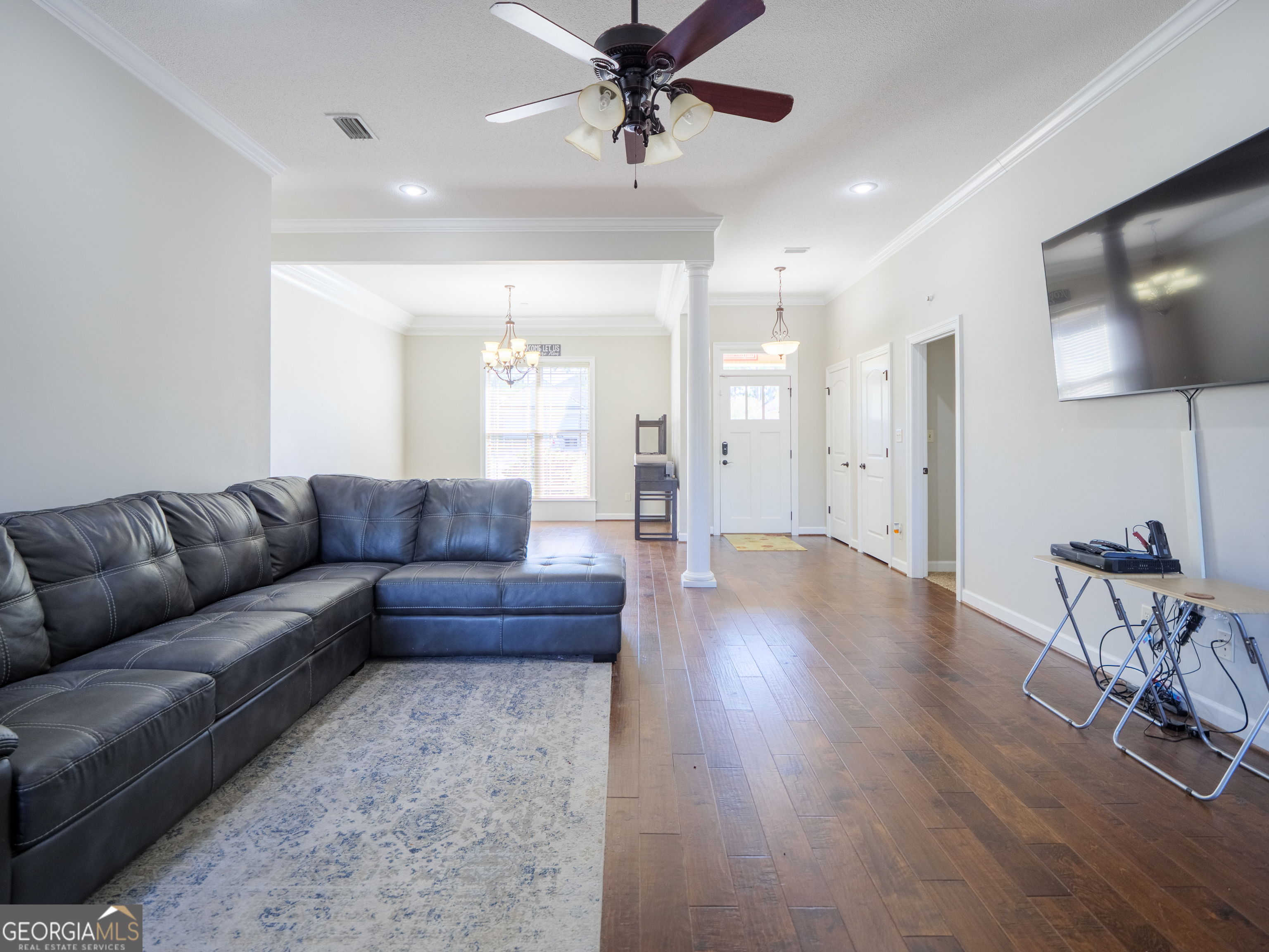 4049 Applecross Road Valdosta, GA 31605 - Photo 13 of 48 a living room with furniture and a wooden floor