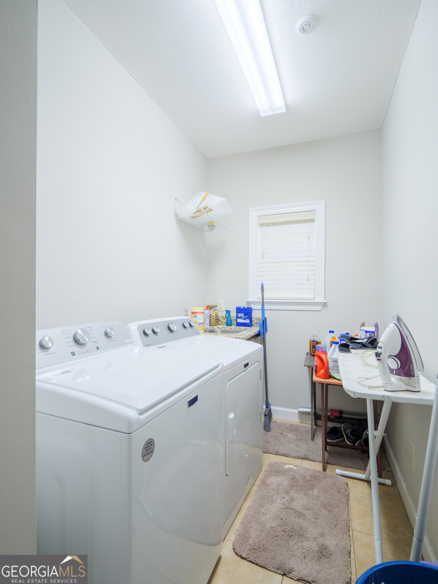 4049 Applecross Road Valdosta, GA 31605 - Photo 27 of 48 a utility room with dryer and washer