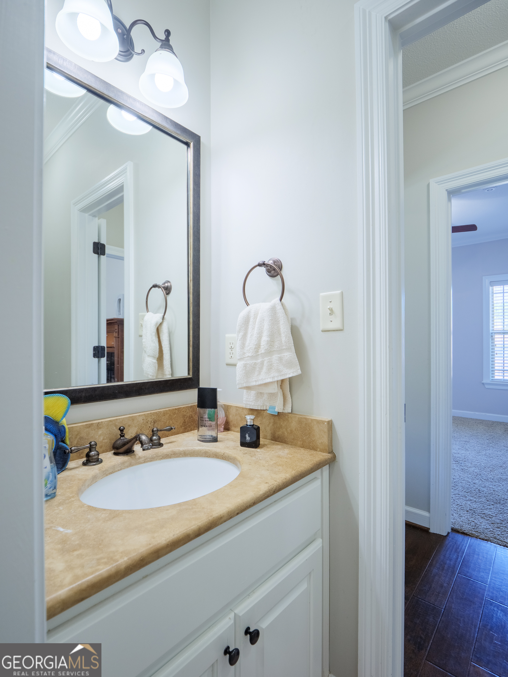 4049 Applecross Road Valdosta, GA 31605 - Photo 42 of 48 a bathroom with a sink and a mirror