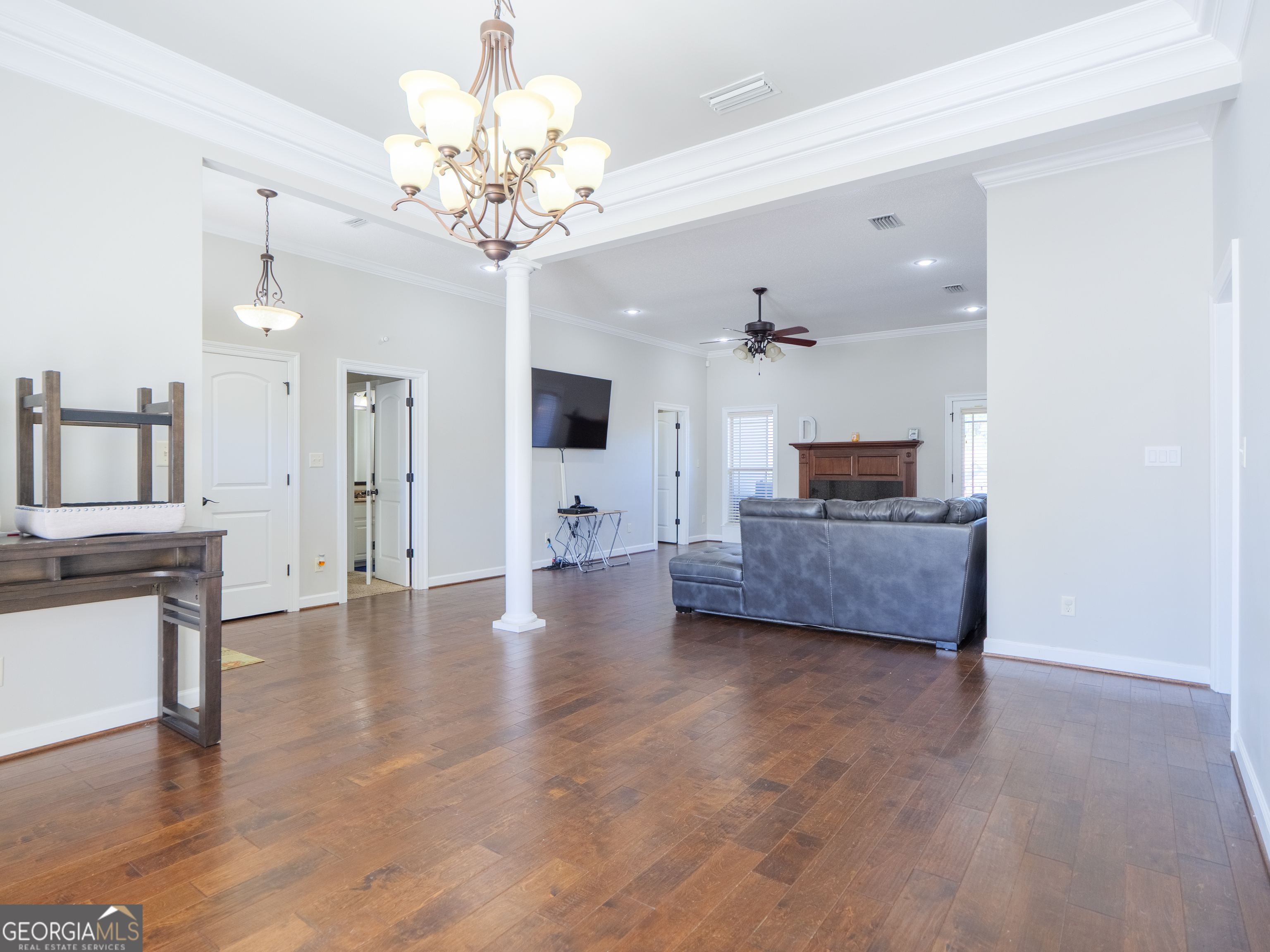 4049 Applecross Road Valdosta, GA 31605 - Photo 10 of 48 a view of a room with wooden floor and a kitchen