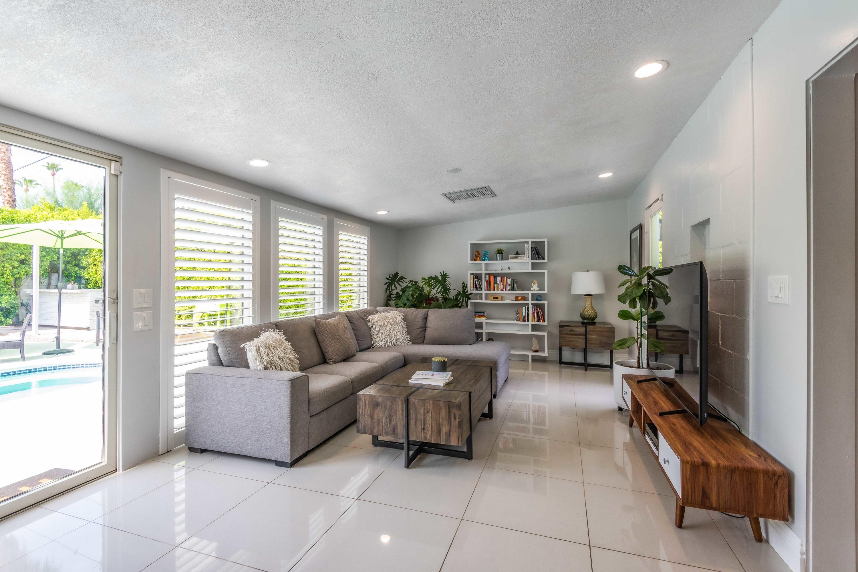 263 East Morongo Road Palm Springs, CA 92264 - Photo 12 of 29 a living room with furniture and a large window
