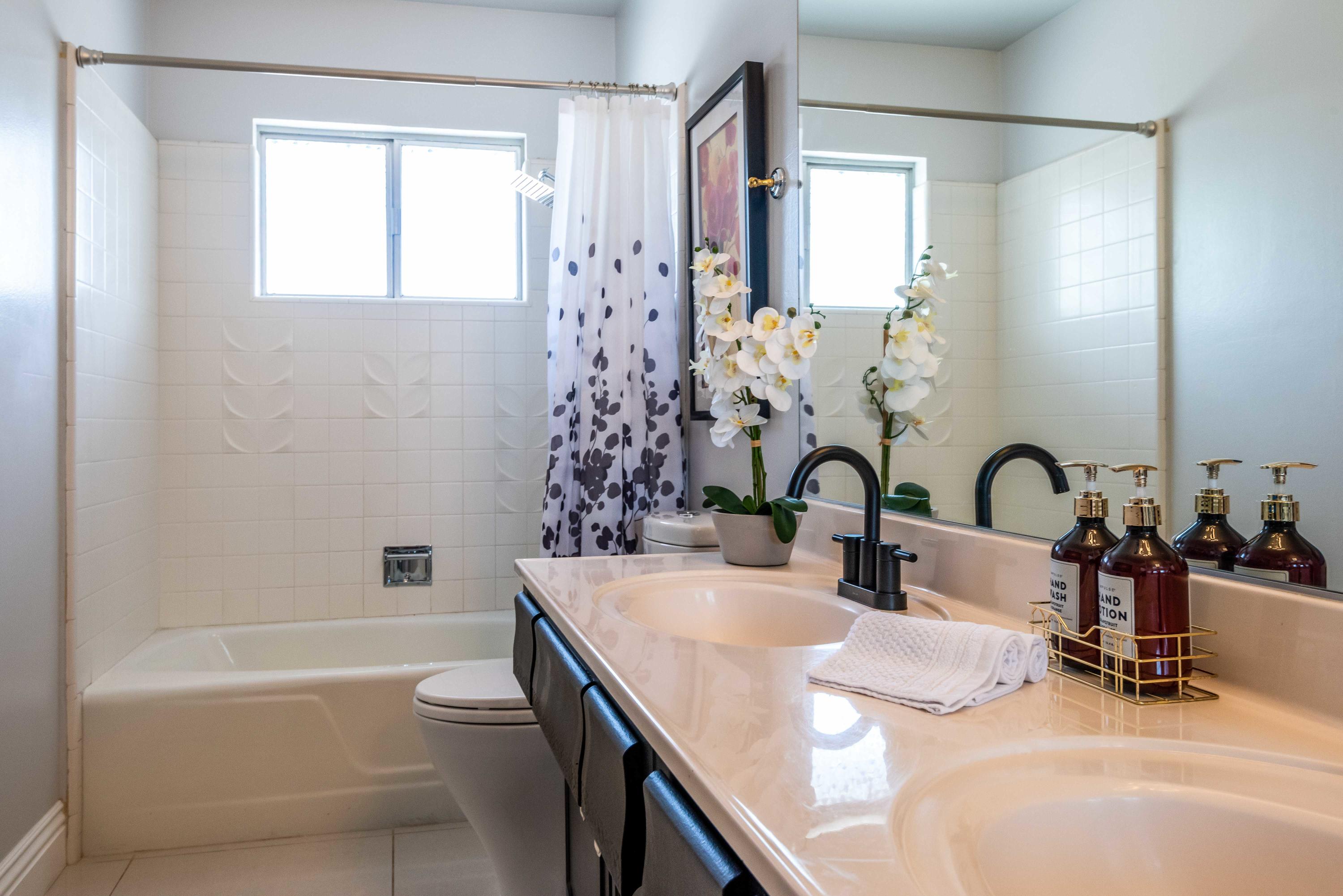 263 East Morongo Road Palm Springs, CA 92264 - Photo 21 of 29 a bathroom with a granite countertop sink a toilet and shower