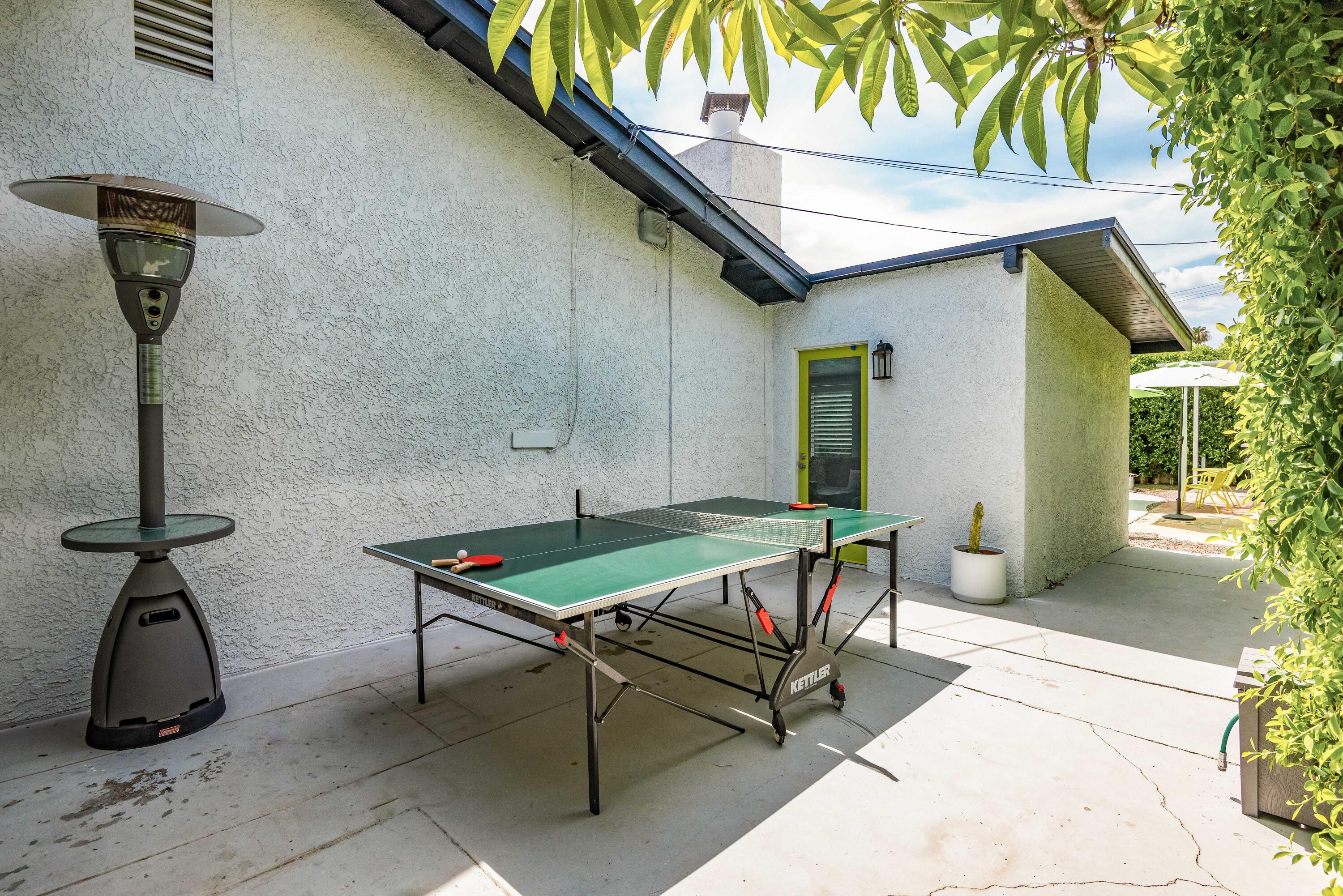 263 East Morongo Road Palm Springs, CA 92264 - Photo 26 of 29 a blue bench sitting in front of a building