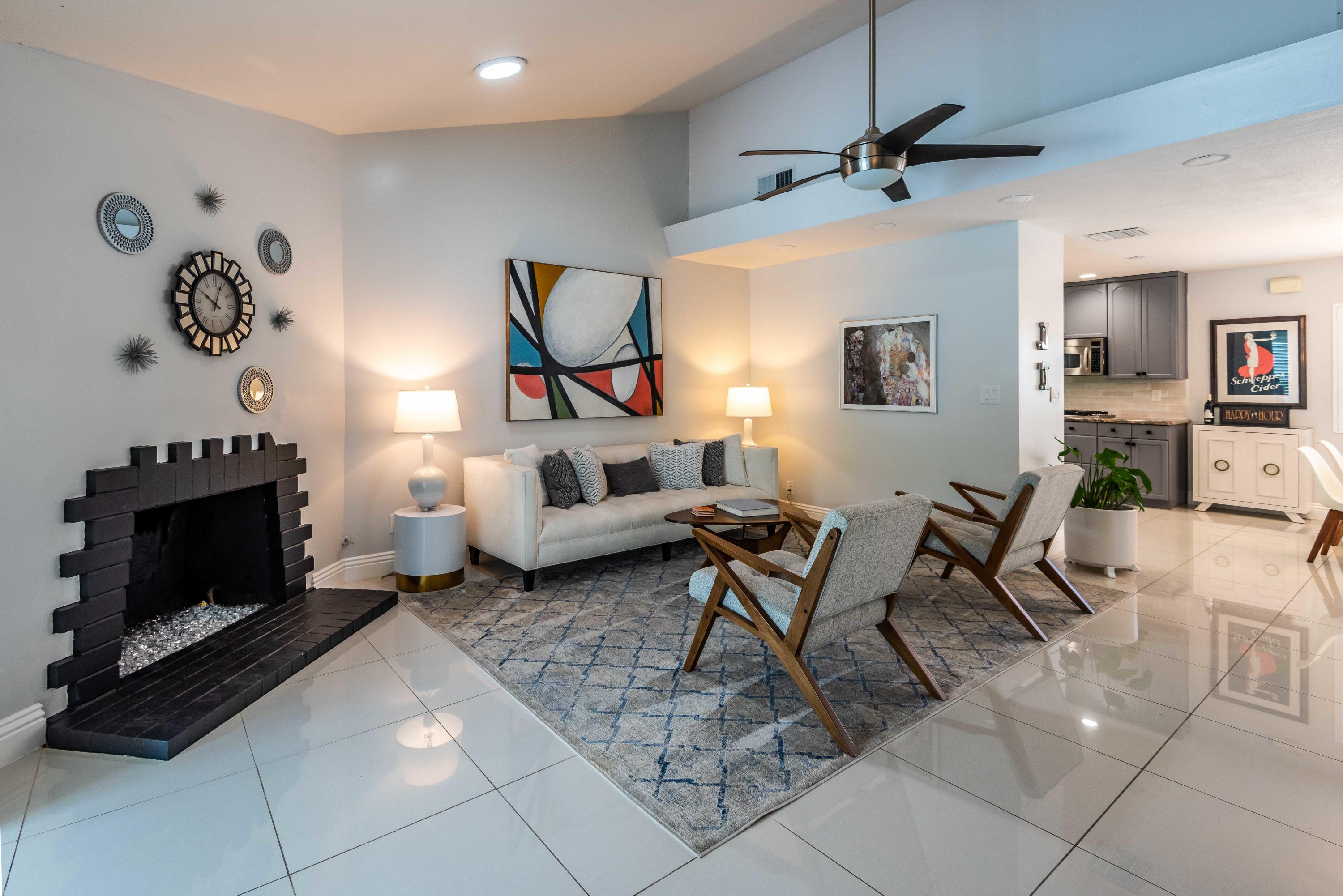 263 East Morongo Road Palm Springs, CA 92264 - Photo 4 of 29 a living room with furniture and a fireplace