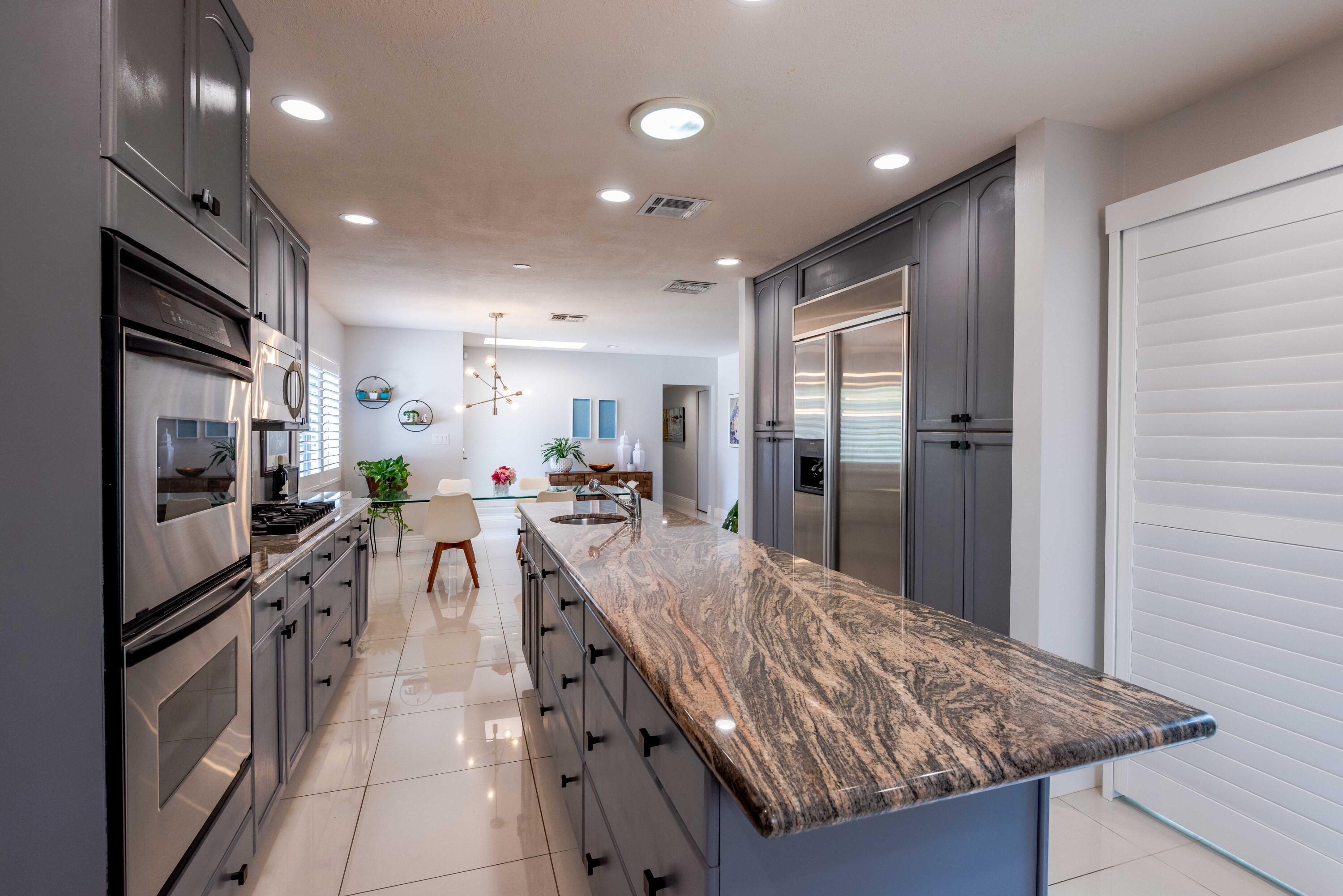 263 East Morongo Road Palm Springs, CA 92264 - Photo 10 of 29 a large kitchen with lots of counter space and refrigerator