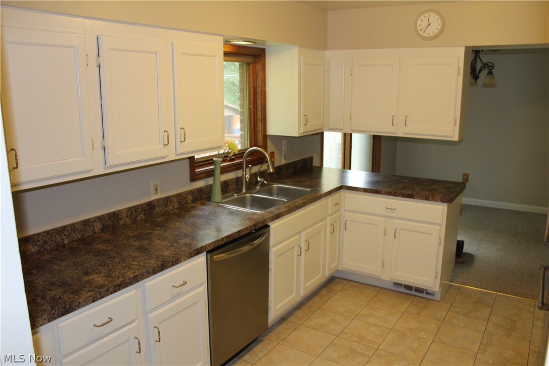 5807 East Sprague Road Independence, OH 44131 - Photo 8 of 33 Kitchen - Recently updated counter tops & freshly painted cabinets and walls