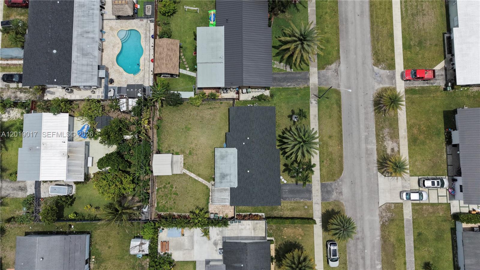 731 Northwest 17th Street Homestead, FL 33030 - Photo 26 of 29 an aerial view of houses with outdoor space