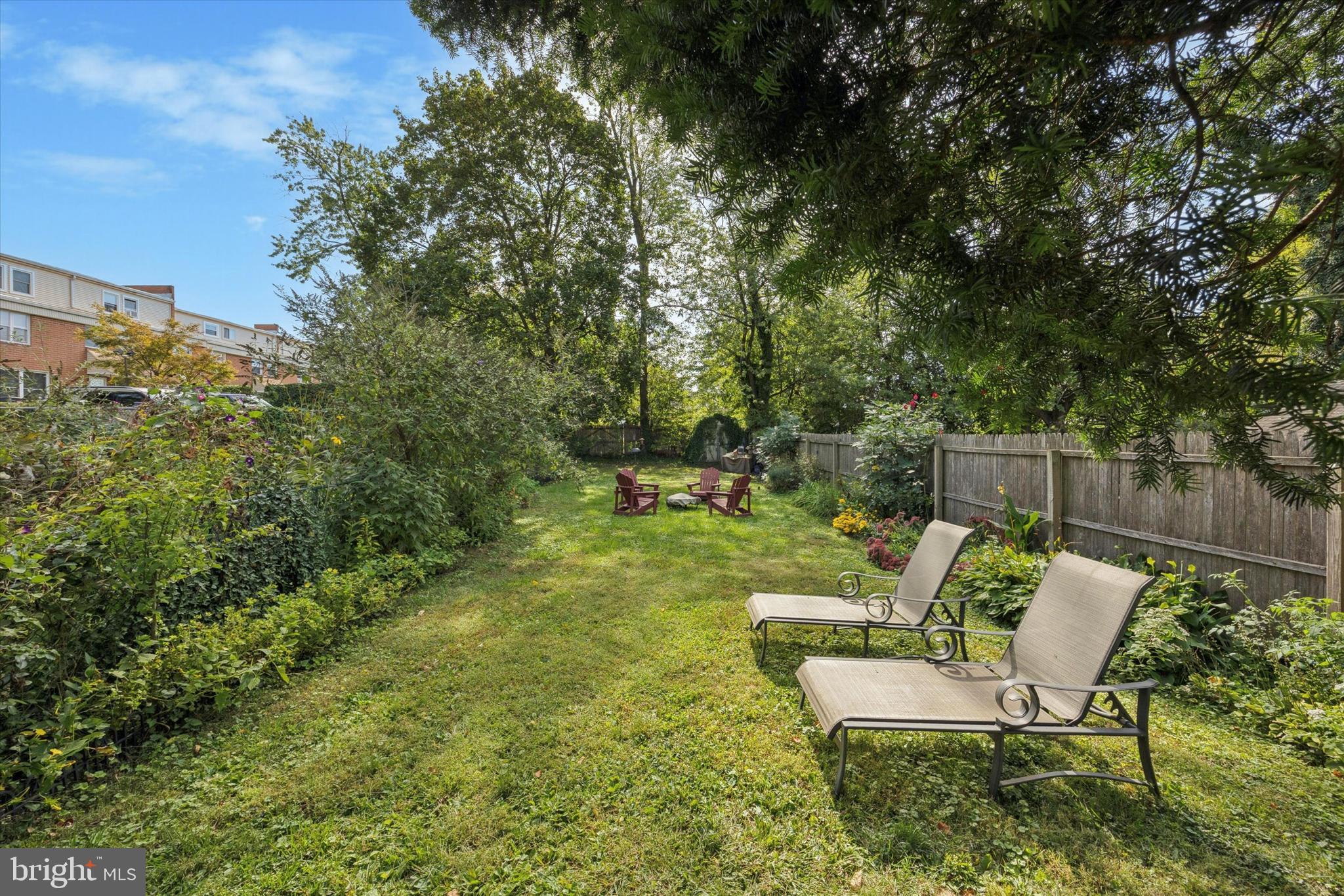 213 Greenfield Avenue Ardmore, PA 19003 - Photo 14 of 15 a view of a chair and table in backyard of the house
