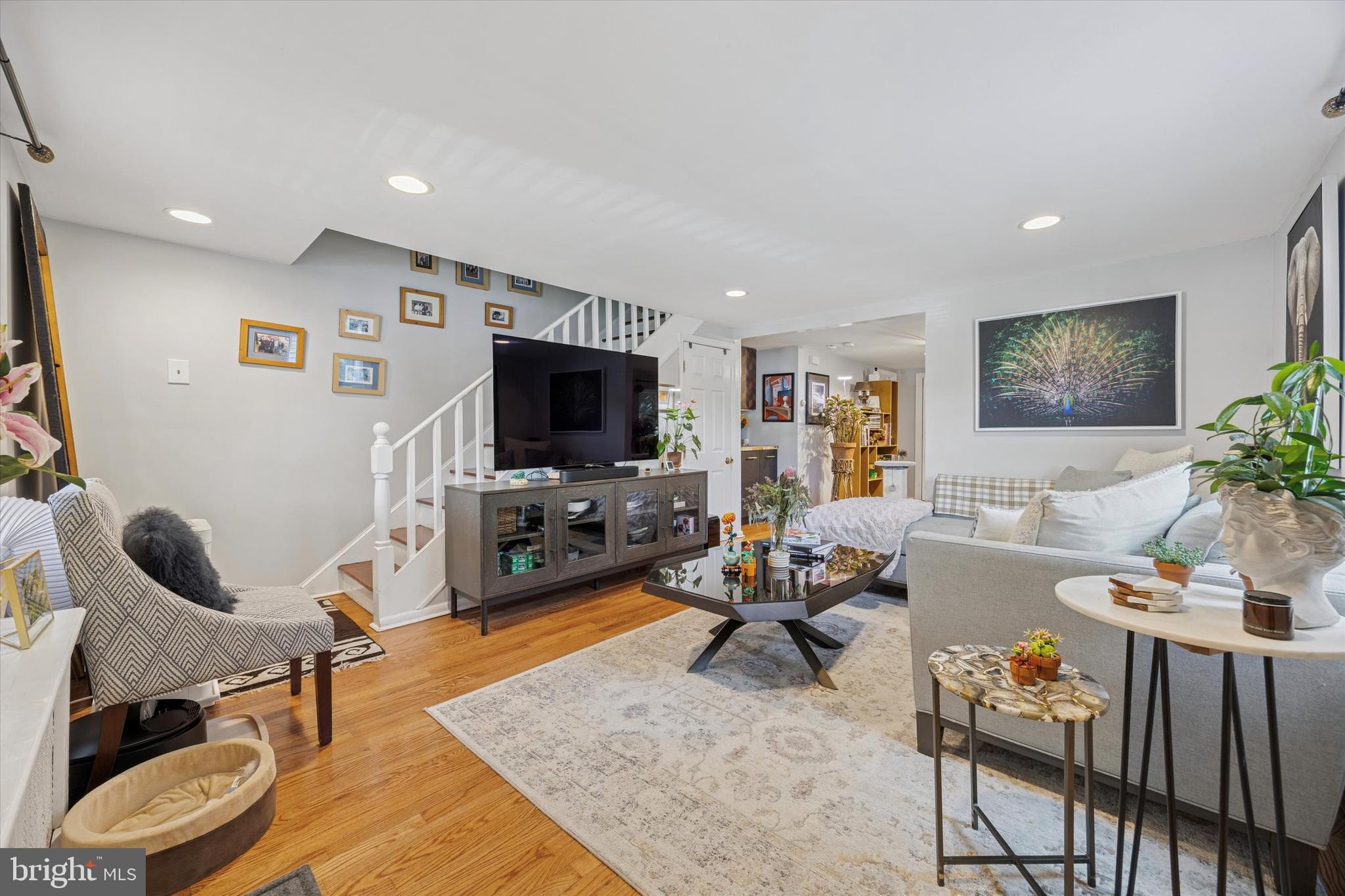 213 Greenfield Avenue Ardmore, PA 19003 - Photo 3 of 15 a living room with furniture and a flat screen tv