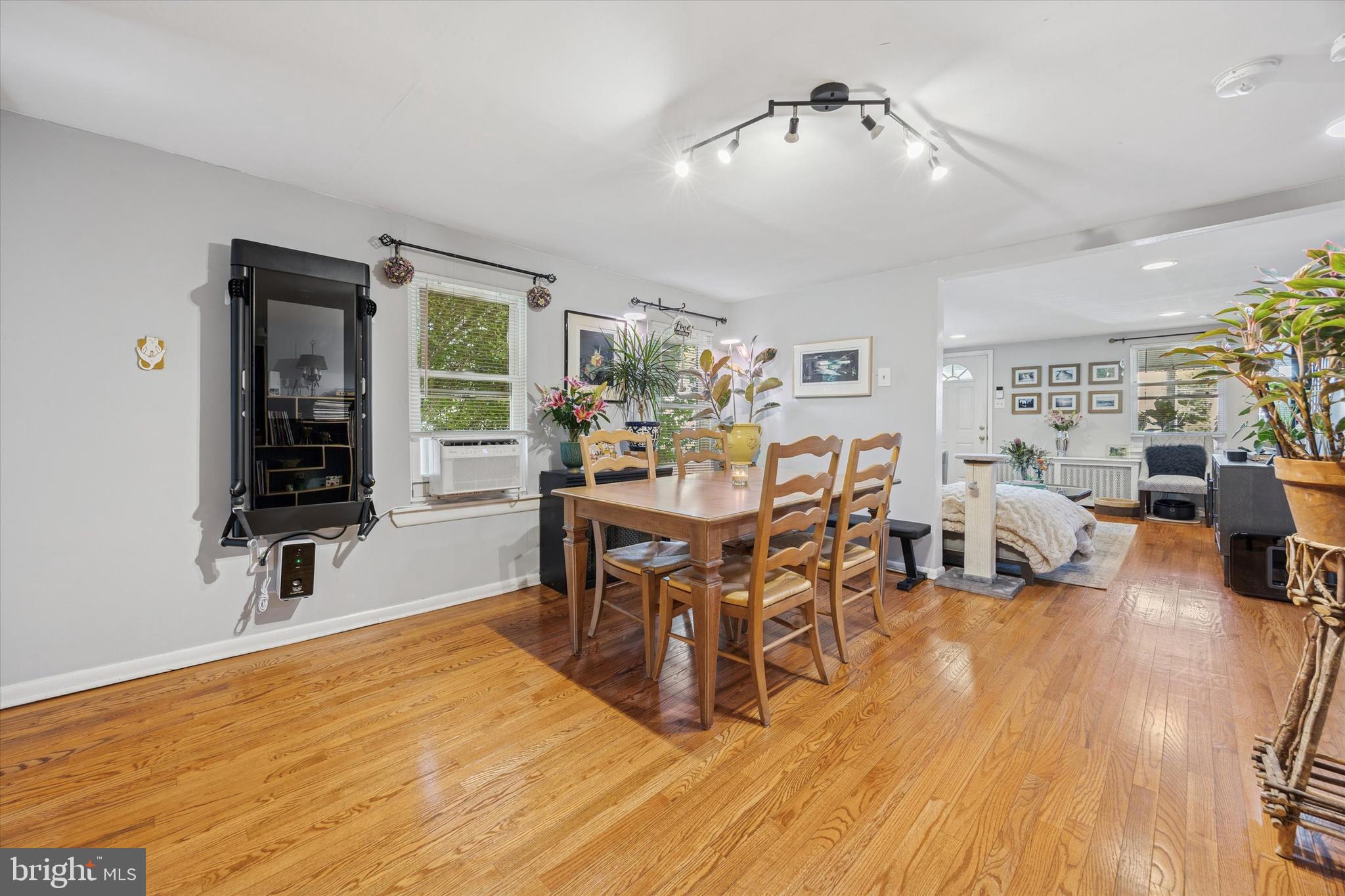 213 Greenfield Avenue Ardmore, PA 19003 - Photo 5 of 15 a living room with furniture dining table and a large window