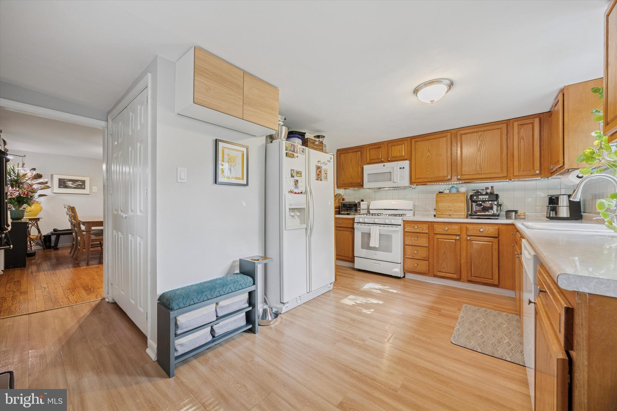 213 Greenfield Avenue Ardmore, PA 19003 - Photo 7 of 15 a kitchen with stainless steel appliances granite countertop a refrigerator and a stove top oven