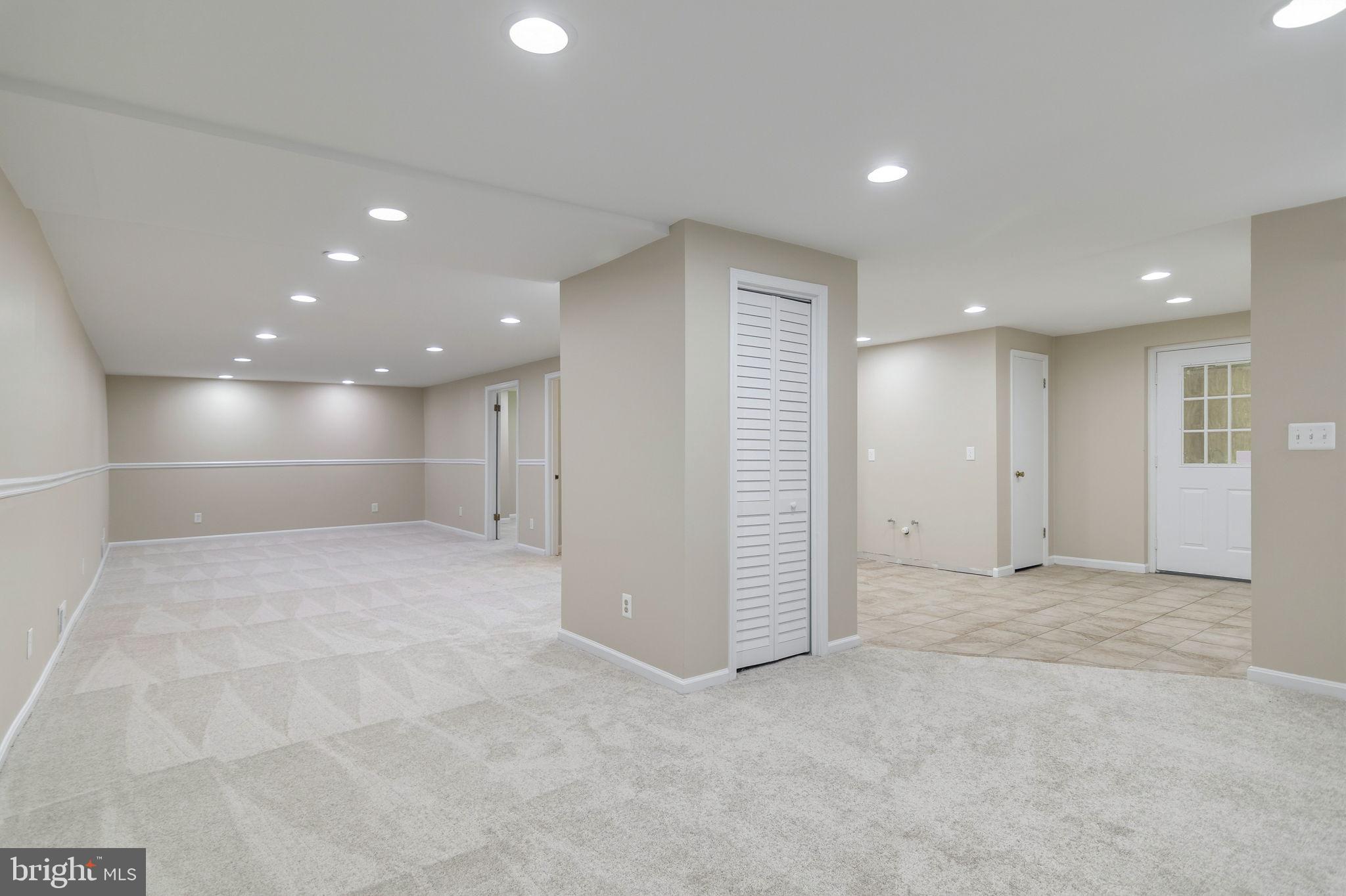 13593 Bethel Road Manassas, VA 20112 - Photo 36 of 54 Finished walkout basement with NEW upgraded carpet