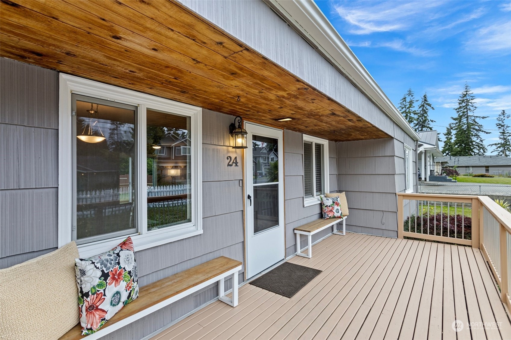 24 Fern Road Everett, WA 98203 - Photo 3 of 27 a view of a chairs and table on the wooden floor