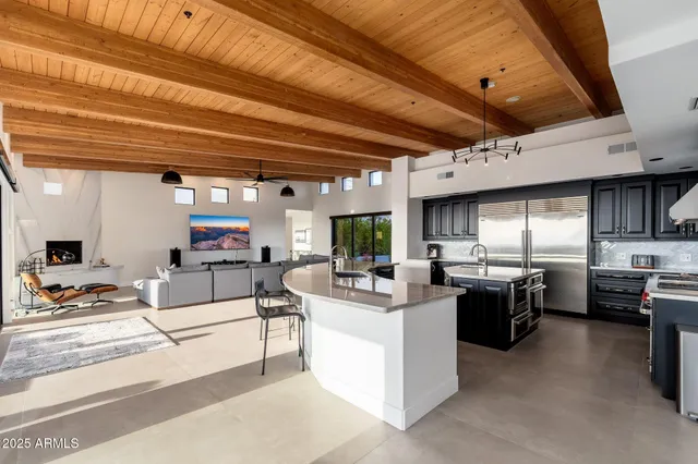 a dining room with a table and chairs