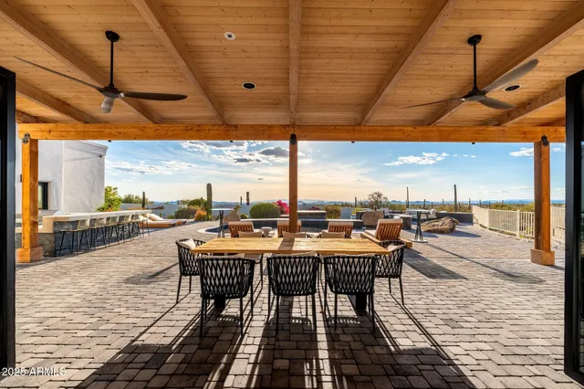 a bathroom with double vanity sink and a mirror