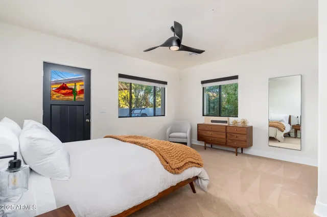 a view of a house with backyard