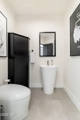 a view of a swimming pool with outdoor seating