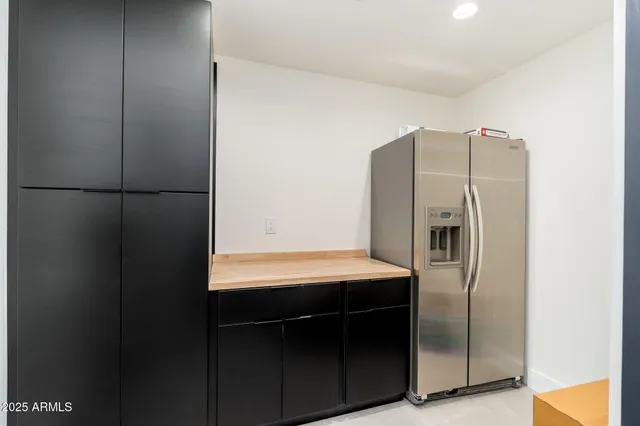 a view of swimming pool with outdoor seating