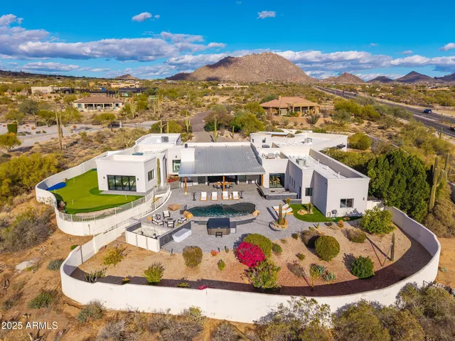 a view of a room with wooden floor and stairs