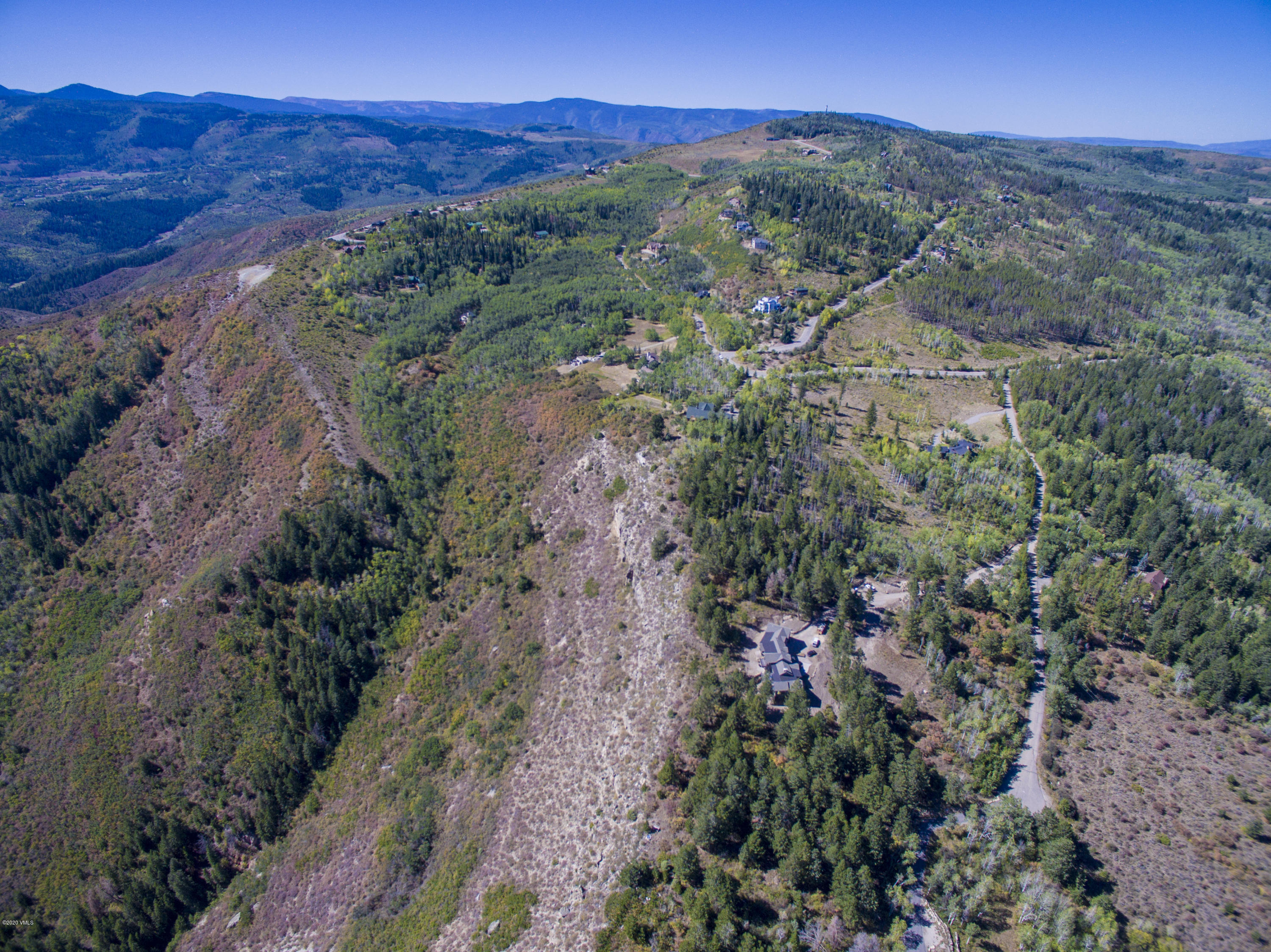 3990 Bellyache Ridge Road Wolcott, CO 81655 - Photo 3 of 17 an aerial view of a city with lots of residential buildings
