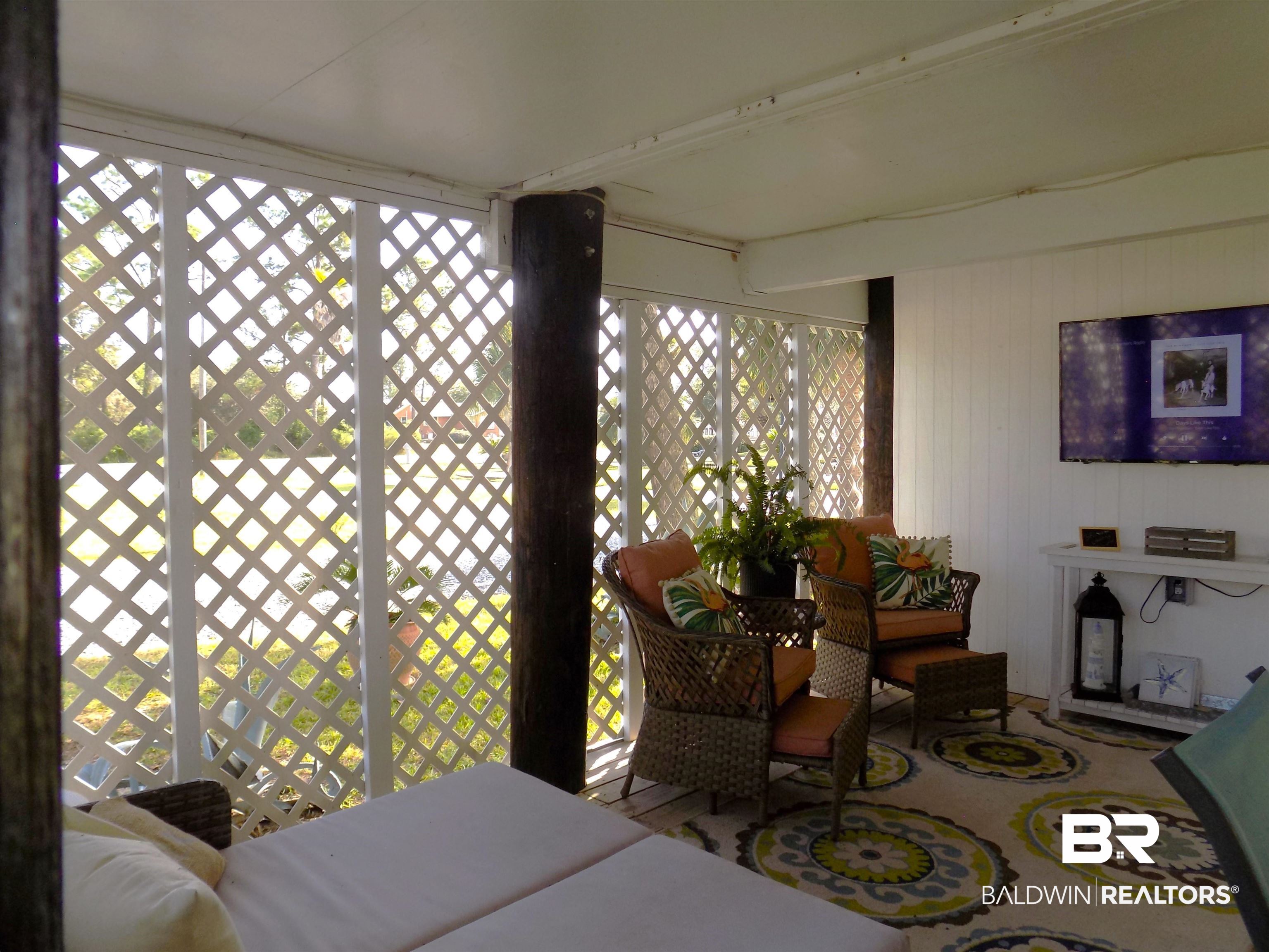 304 Windmill Ridge Road Gulf Shores, AL 36542 - Photo 18 of 29 Sunroom with beam ceiling