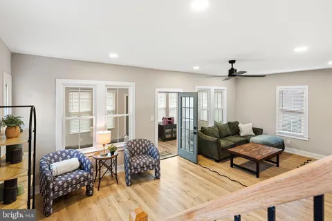 a view of a dining room with furniture and window