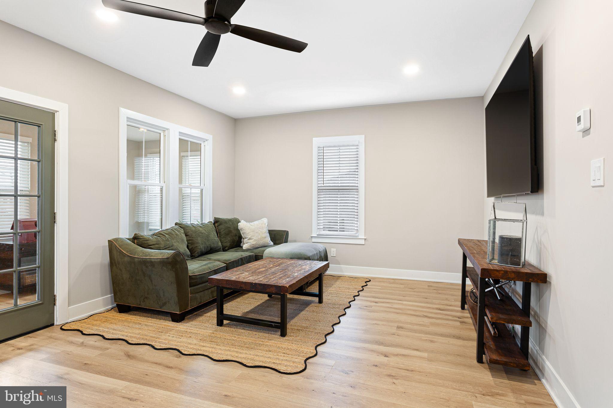 1 Maple Avenue Haddon Township, NJ 08108 - Photo 16 of 87 a living room with furniture and a flat screen tv