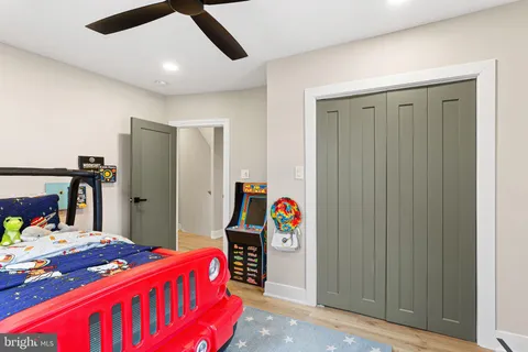 a view of a room with wooden walls