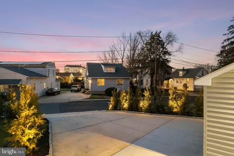 a front view of a house with parking space