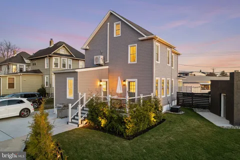 a front view of a house with a porch