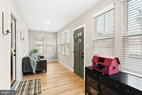 a living room with furniture and a couch