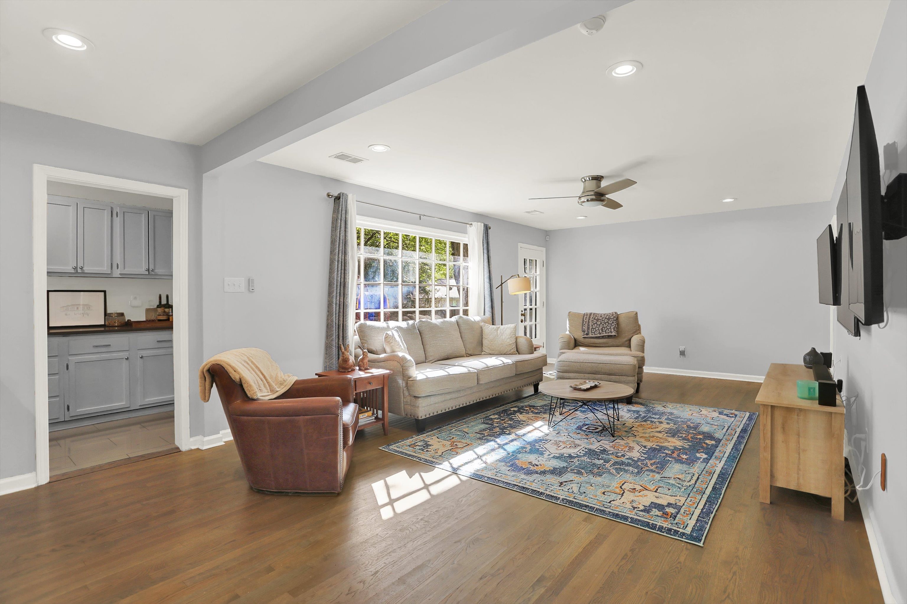462 North Mendenhall Road Memphis, TN 38117 - Photo 18 of 26 Living room with ceiling fan and dark wood-type flooring