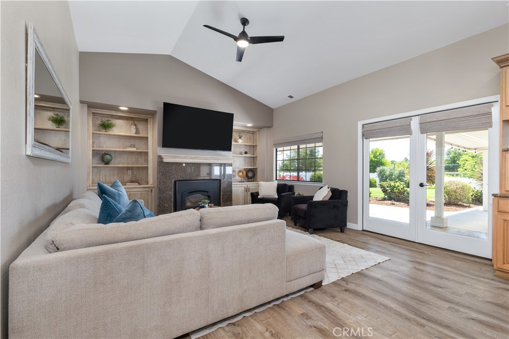 1275 Shane Lane Templeton, CA 93465 - Photo 19 of 70 a living room with fireplace furniture and a flat screen tv