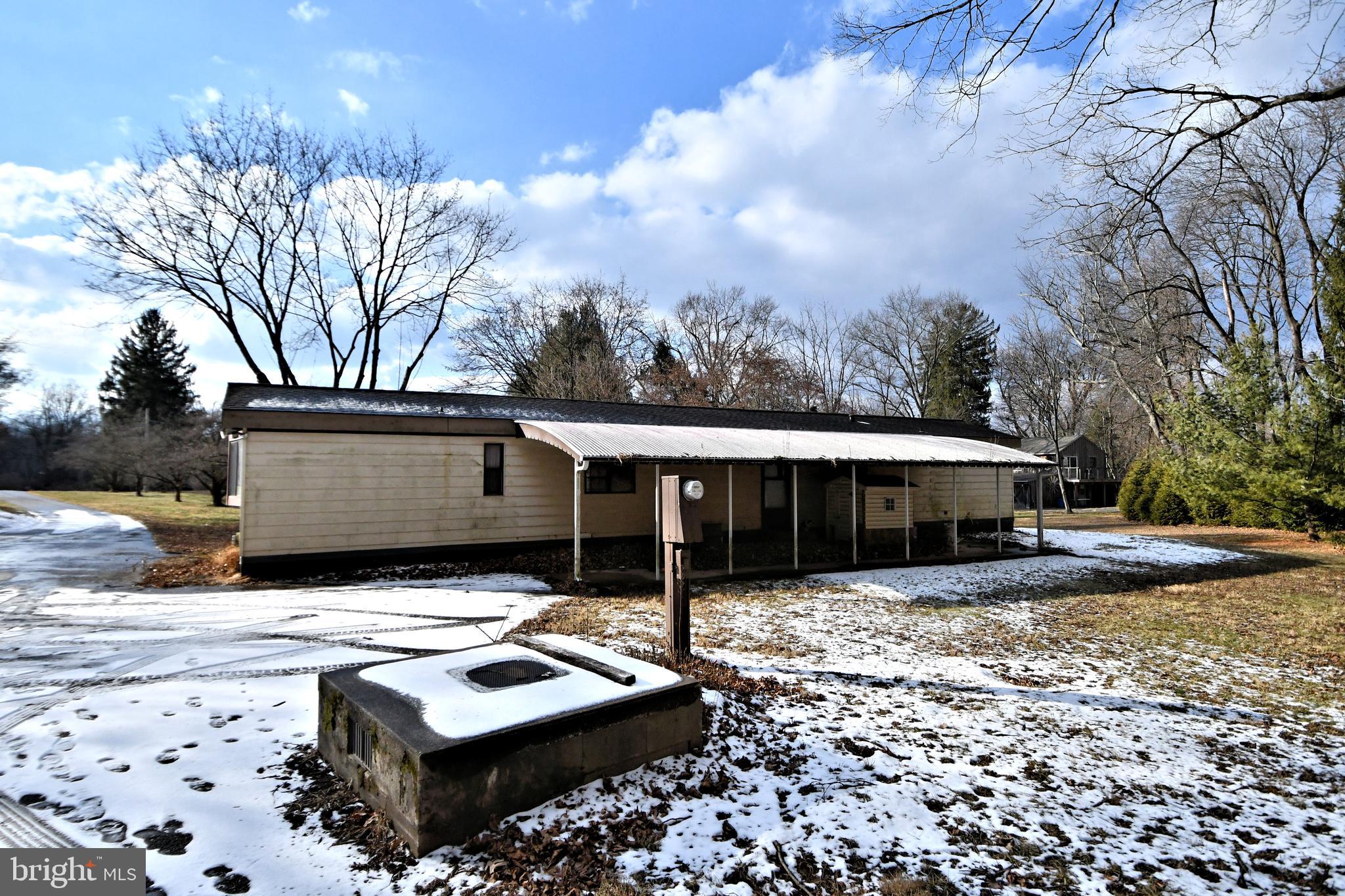 433 Saylors Mill Road Spring City, PA 19475 - Photo 4 of 40 a view of a house with backyard