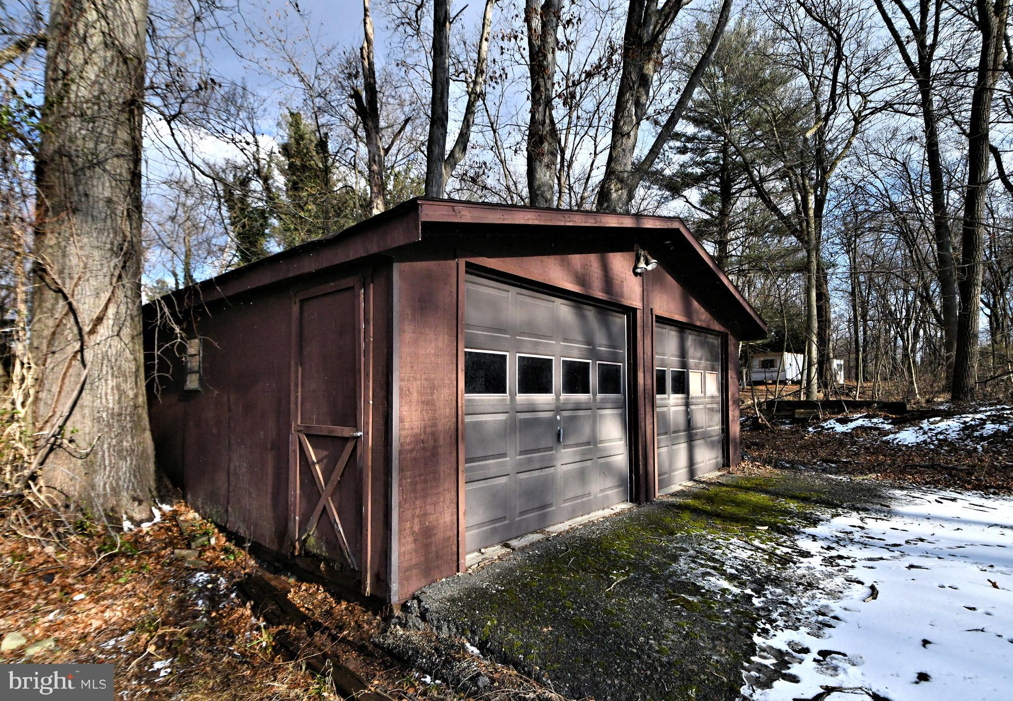 433 Saylors Mill Road Spring City, PA 19475 - Photo 6 of 40 a front view of a house with garden