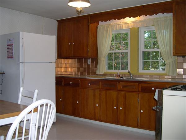 5 Millbrook Road Beverly, MA 01915 - Photo 5 of 5 a kitchen with a window countertop cabinets and a sink